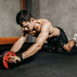 Man in Black Shorts Doing Push Up