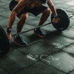 Man About to Lift Barbell