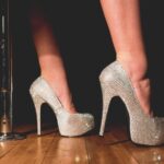 woman in gray platform stilettos