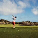 Man in White T Shirt Playing Golf