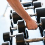 a close-up of a person working out on a machine