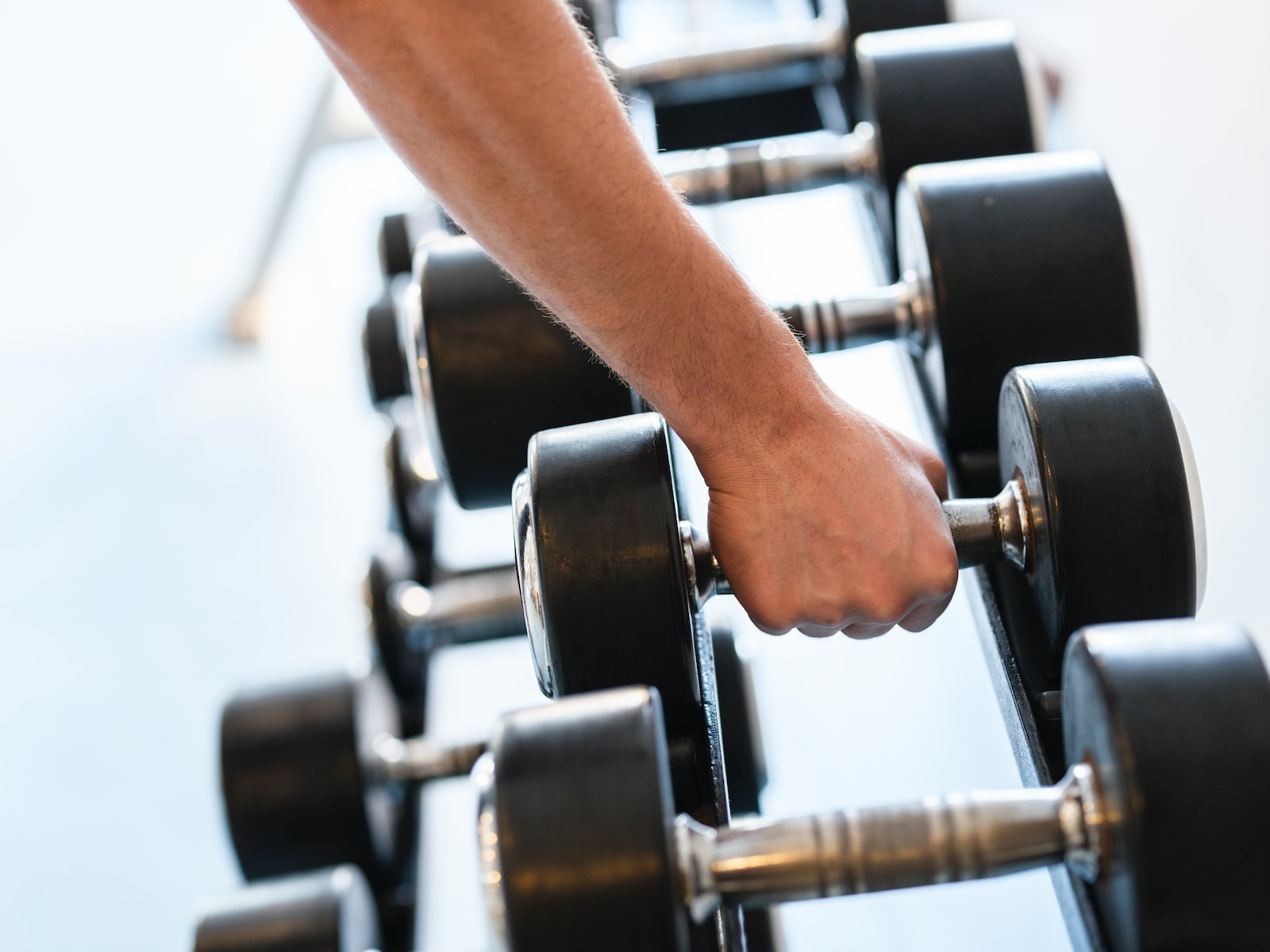 a close-up of a person working out on a machine