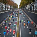 people running on road during daytime